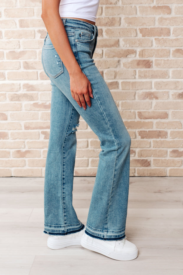 JUDY BLUE Isla Mid Rise Distressed Released Hem Bootcut Jeans